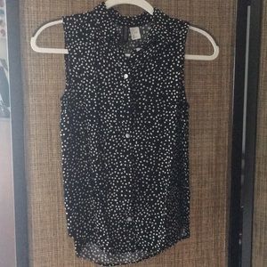 Sleeveless collared button down polka-a-dot top